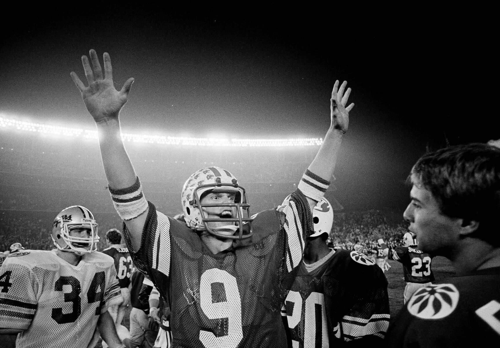 1981: Jim McMahon passes for 552 yards, Gordon Hudson sets yardage record in BYU win